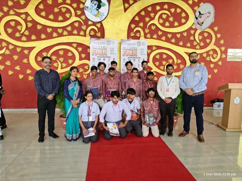 School student cohort and faculty outdoors holding certificates