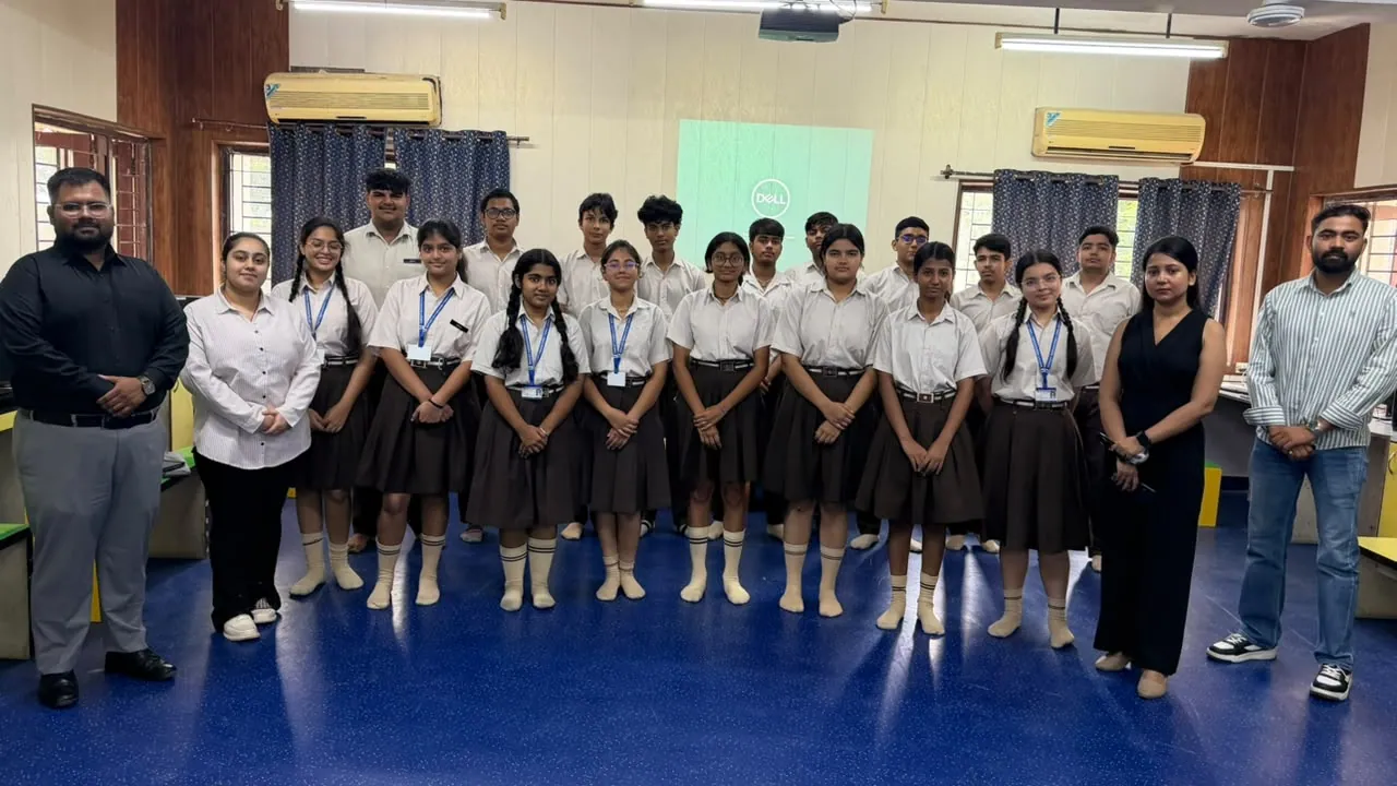 Formal cohort group photo of students and facilitators in school lab